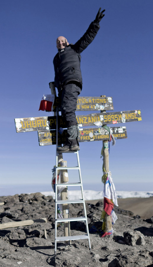 Writer Sean O'Toole stands above Kilimanjaro's peak, January 2011